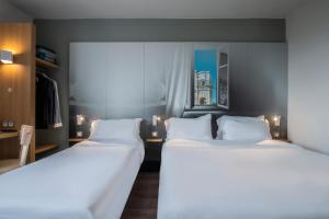 Hotels B&B HOTEL Orange - Echangeur A7 A9 : Chambre Triple