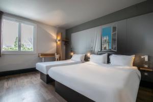 Hotels B&B HOTEL Orange - Echangeur A7 A9 : photos des chambres