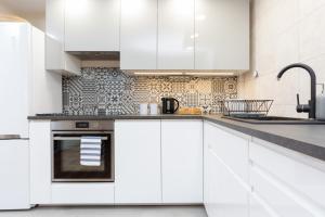 Apartments Warsaw Królewska by Noclegi Renters