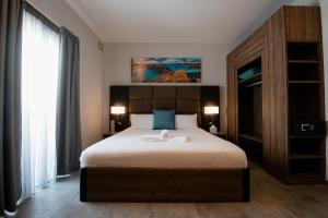 Standard Double Room with Balcony/ Urban View room in Pebbles Resort