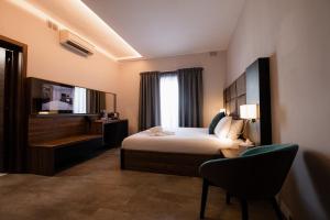 Superior Double Room with Balcony / Pool view room in Pebbles Resort