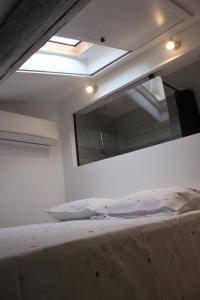 Appartements Le refuge des arenes : photos des chambres