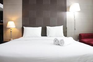 Prime and Comfy Studio at Tamansari La Grande Apartment By Travelio