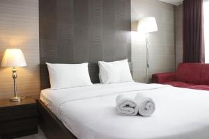 Prime and Comfy Studio at Tamansari La Grande Apartment By Travelio