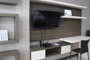 Prime and Comfy Studio at Tamansari La Grande Apartment By Travelio