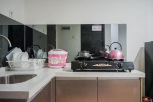 Compact and Cozy Studio at Brooklyn Alam Sutera Apartment By Travelio