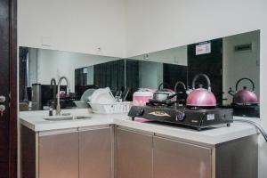 Compact and Cozy Studio at Brooklyn Alam Sutera Apartment By Travelio