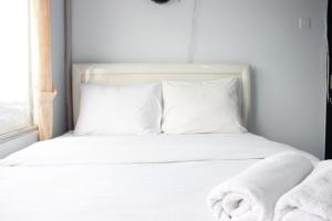 Modest 2BR Apartment at The Jarrdin Cihampelas By Travelio