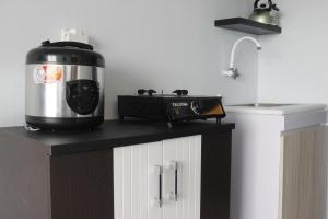 Modest 2BR Apartment at The Jarrdin Cihampelas By Travelio