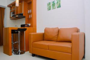 2BR Bassura City Apartment with Nice Interior Design By Travelio