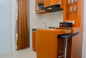 2BR Bassura City Apartment with Nice Interior Design By Travelio