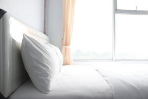 Quite 2BR Apartment at The Jarrdin Cihampelas By Travelio