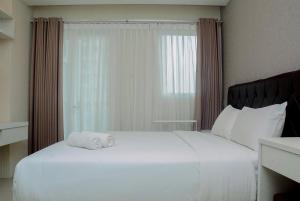 Marvelous Studio Signature Park Grande Apartment By Travelio