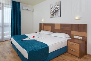 One-Bedroom Suite with Balcony and Sea View (2 Adults + 2 Children) room in Paradise Beach Residence - Ultra All Inclusive