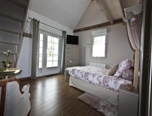 B&B / Chambres d'hotes La Haute Muraille : photos des chambres