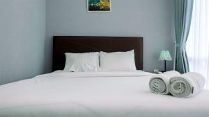 Classy 2BR Apartment at Menteng Park with City View By Travelio