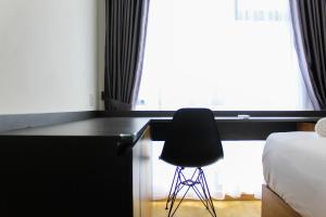 Warm and Cozy 3BR Apartment at M-Town Residence By Travelio