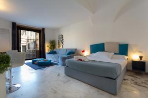 Quadruple Room with Balcony room in Le Suites Del Duomo House