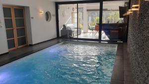 Appartements Villa les Agapanthes avec piscine et SPA chauffee dans votre appartement : photos des chambres