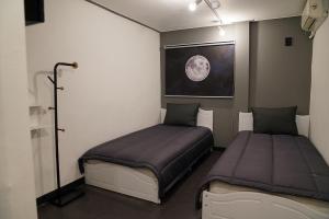 Phòng Hai Giường Đơn Loại Sang (Deluxe Twin Room)