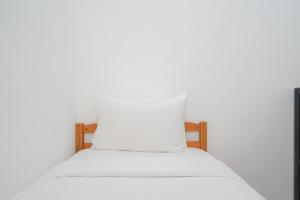 Comfy and Modern 2BR Apartment at Aeropolis Residence By Travelio