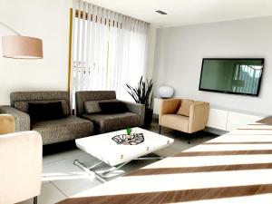 Appartements Appart'Hotel Luxapparts : photos des chambres