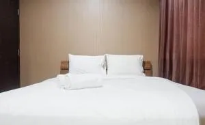 Minimalist 2BR Apartment at Tamansari Papilio By Travelio - Waru