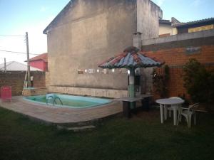 CASA PRAIA BEIRA MAR COM PISCINA 5 QUARTOS ACOMODA 12 pessoas