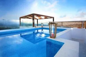 Villa Archontiki, with rooftop pool and stunning panoramic views! - 埃皮斯科皮·罗希姆诺