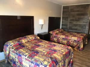 Double Room with Two Double Beds and Kitchenette room in Cooks Motel