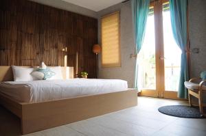 Phòng Có Giường Cỡ Queen Nhìn Ra Biển (Queen Room with Sea View)