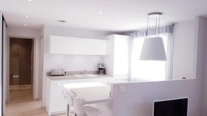 Appartements Le White Cosy a 5 minutes du Lac avec parking privatif gratuit : photos des chambres