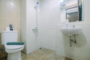 Modern and Comfy Studio Apartment Grand Dhika City By Travelio