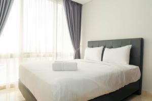 Posh 2BR with Private Lift at Masterpiece The Epicentrum Kuningan Apartment By Travelio