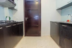 Posh 2BR with Private Lift at Masterpiece The Epicentrum Kuningan Apartment By Travelio