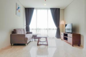Posh 2BR with Private Lift at Masterpiece The Epicentrum Kuningan Apartment By Travelio