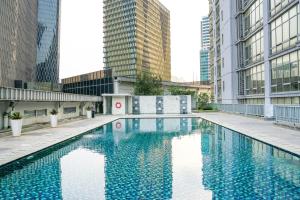 Posh 2BR with Private Lift at Masterpiece The Epicentrum Kuningan Apartment By Travelio