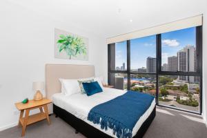 2-Bed Beach Apartment with Pool, Parking & Balcony