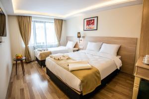 Standard Triple Room room in Royal Bosphorus Hotel