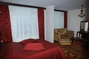Junior Suite (2 Adults + 1 Child) room in Cihan Hotel