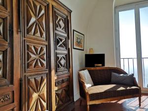 Appartements Dans village medieval pietonnier, Suite executive vue mer exceptionnelle : photos des chambres
