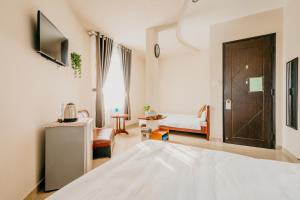 Phòng Hạng Tiết kiệm Cho 4 Người (Economy Quadruple Room)