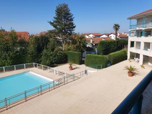 Appartement Golf et Nivelle avec piscine et parking