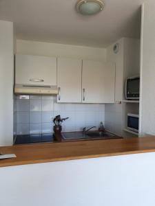 Appartements Appartement Golf et Nivelle avec piscine et parking : photos des chambres