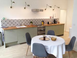 Appartements The place to be : photos des chambres