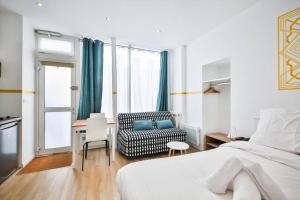 Appartements cosy independant studio proche gare et jardin : photos des chambres