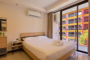 NaiHarn Sea Condo by Holy Cow, 1-BR, courtyard view