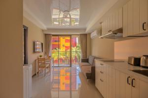 NaiHarn Sea Condo by Holy Cow, 1-BR, courtyard view