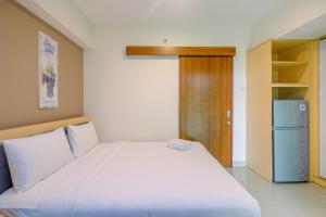 Well Furnished 1BR Grand Kamala Lagoon Apartment By Travelio