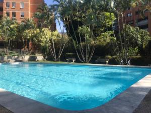 a hotel com villa del poblado